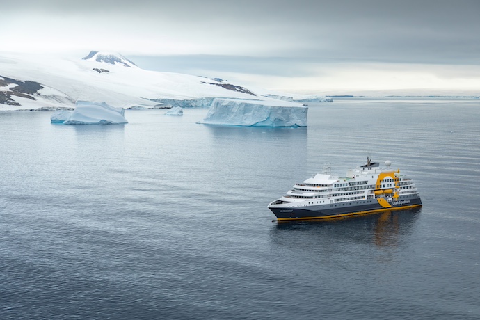 cruise ship with icebergs in greenland