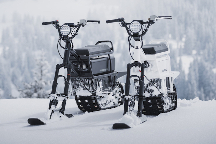 two moonbikes in the snow