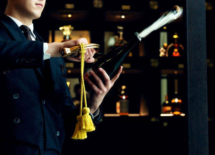 st regis butler sabering champagne