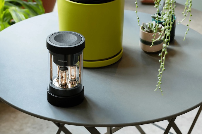 Balmuda speaker on a patio table