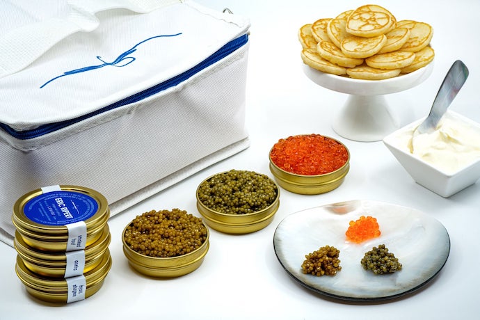 eric ripert caviar flight, with caviar tins and blinis