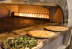 Thin-Crust Pizza and Champagne at Danny Meyer's Latest
