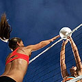 Models Playing Beach Volleyball