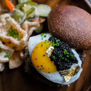 Dollar Oysters and Caviar-Covered Burgers Live Here